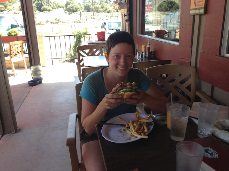 Eating a burger at Paradise Valley Cafe.