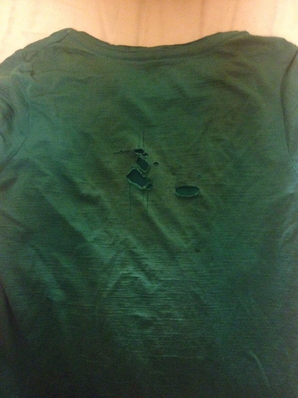 Holes in the back of my Icebreaker Tech Tee, in Bend OR.